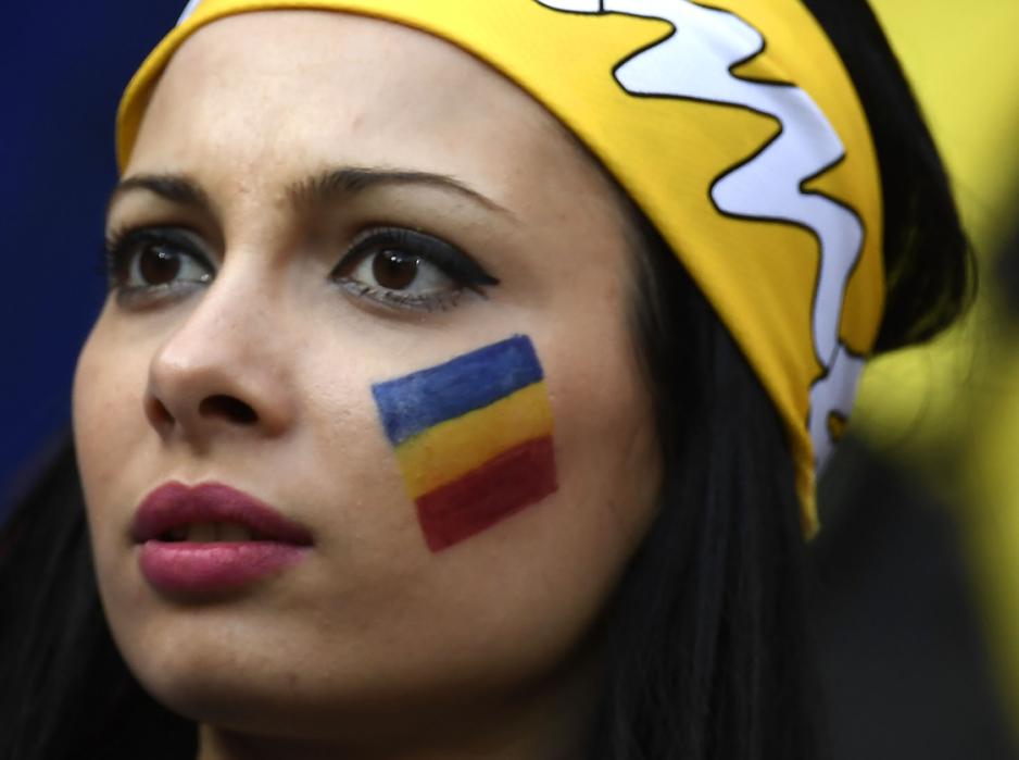 A Romania supporter is pictured ahead the Euro 2016 group A football match between Romania and Albania at the Parc Olympique Lyonnais stadium in Lyon on June 19, 2016. / AFP PHOTO / jeff pachoud