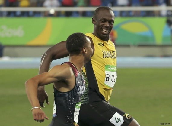 JO-2016/Athlétisme: les mots de Usain Bolt à Andre de Grasse en pleine course