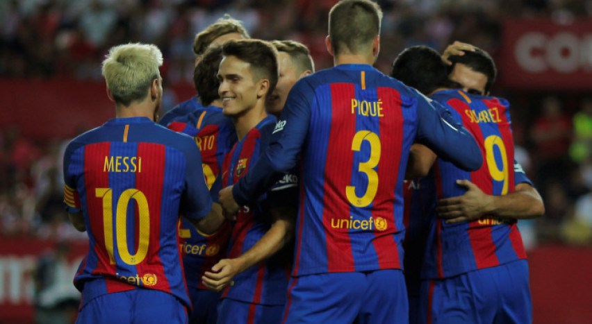 Ramon Sanchez Pizjuan stadium, Seville, Spain - 14/08/16 Barcelona's Luis Suarez (R) is congratulated by his team mates after scoring against Sevilla.