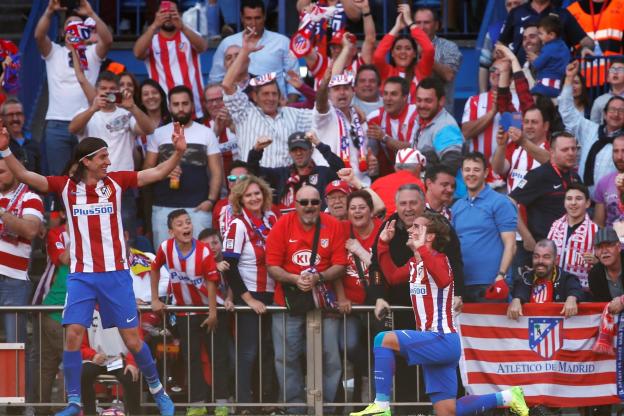 Liga: l’Atletico bat Seville et revient à deux longueurs