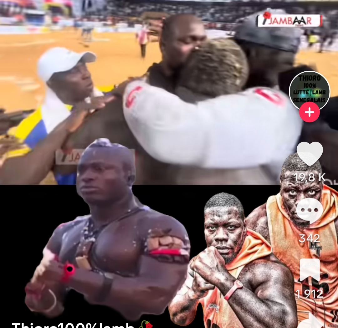 Franc célèbre sa victoire en embrassant Modou Lo à l’arène nationale de Pikine