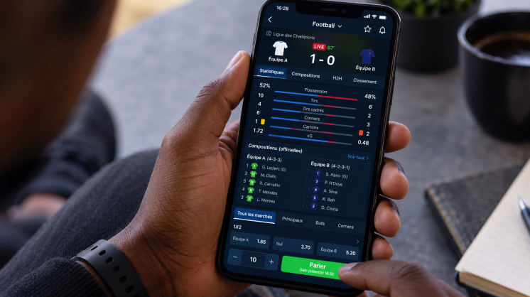 Statistiques d’un match de football affichées sur une application de paris mobile